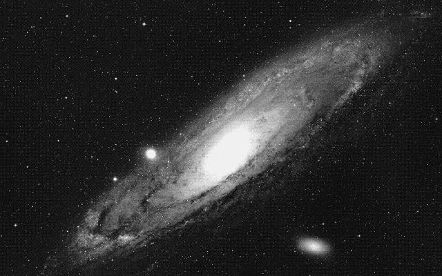 A stunning view of the Andromeda galaxy, with two clusters nearby